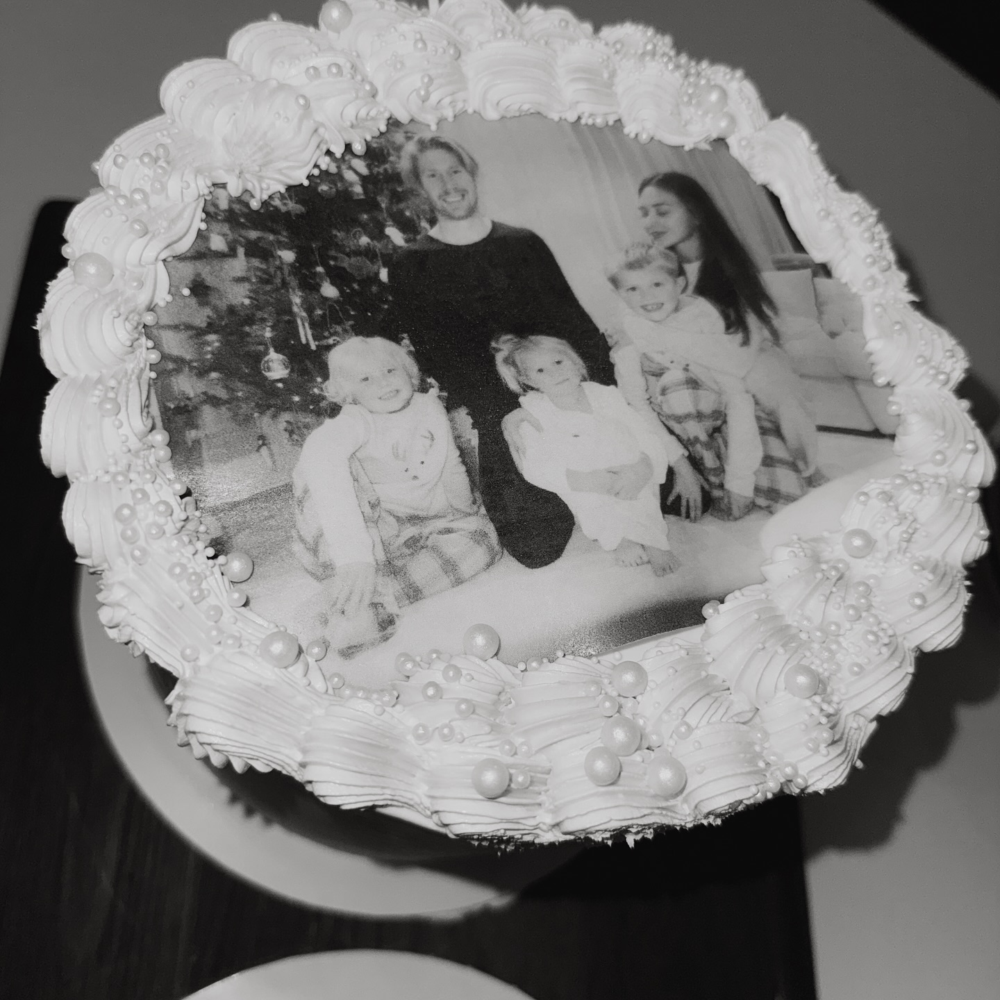 De Bruyne family Christmas photo printed on a celebration cake